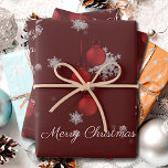 Red Christmas Ornaments Wrapping Paper Sheets<br><div class="desc">Add festive sparkle to your packages with these Red Christmas Ornaments Wrapping Paper Sheets. Featuring elegant Christmas ornaments with ribbon and bows and dangling hanging baubles, the design is accented by delicate white snowflakes for a cheerful holiday theme. The joyful greeting Merry Christmas appears in elegant script, while the simple...</div>