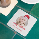 Red Christmas Santa Hat Cute Party Square Paper Coaster<br><div class="desc">Celebrate the season with Merry Christmas party supplies featuring a cute red and white design! 🎄✨ This festive item showcases a watercolor Santa Claus hat, whimsical calligraphy script, and a circle photo template to personalise with your custom family name. Perfect for holiday parties, this classic Xmas decor blends simple minimalist...</div>