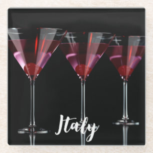 Red cocktails in martini glass with cherry coaster