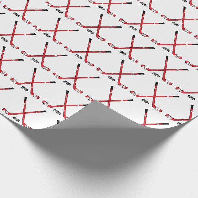 Red Crossed Hockey Sticks and Puck Wrapping Paper (Corner)