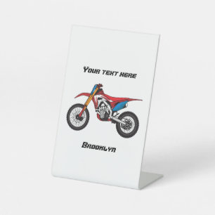Red dirt bike motorcycle pedestal sign
