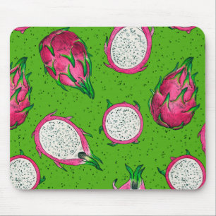 Red dragon fruit on green mouse pad