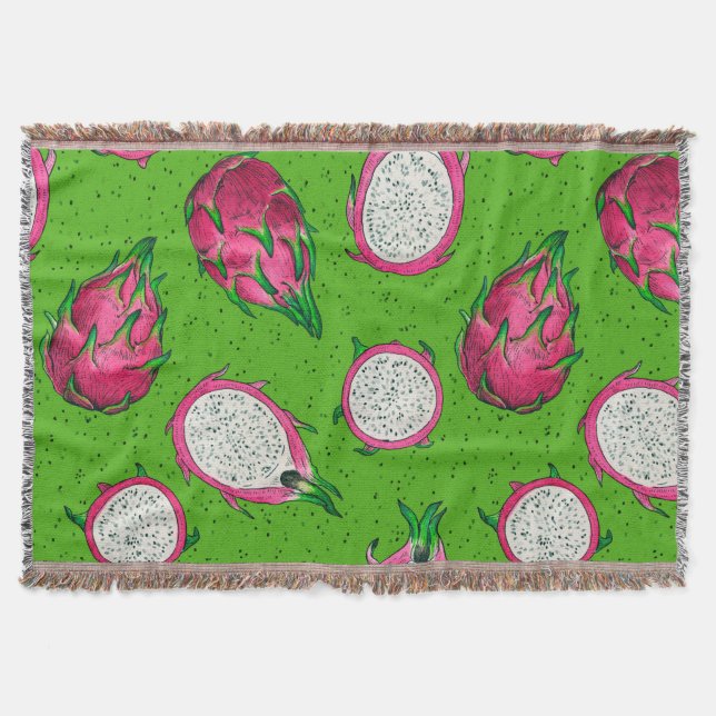 Red dragon fruit on green throw blanket (Front)