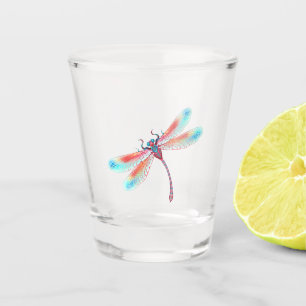 Red dragonfly on watercolor background shot glass
