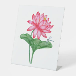 red dragonfly pedestal sign