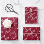 Red Elegant Script Merry Christmas Wrapping Paper Sheet<br><div class="desc">Elegant red Christmas wrapping paper sheets with a holiday greeting in a modern script font.</div>