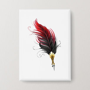 Red feather pen with gold nib