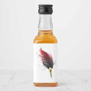 Red feather pen with gold nib liquor bottle label