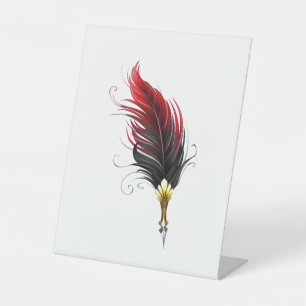 Red feather pen with gold nib pedestal sign