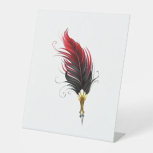 Red feather pen with gold nib pedestal sign