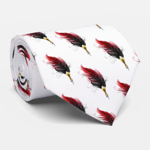Red feather pen with gold nib tie
