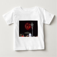 Red Fireworks Celebration with Lamppost Image