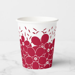 Red flowers daisies on white background paper cups