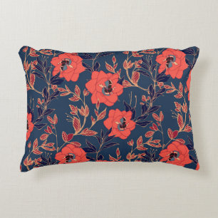 Red flowers of roses and peonies with leaves and p decorative cushion