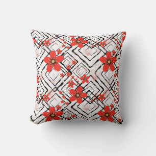 Red flowers on a white, black background. cushion
