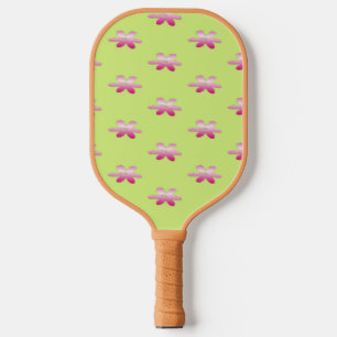 Red flowers on green pickleball paddle