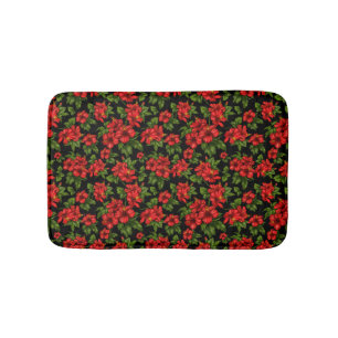Red flowers on the black background bath mat