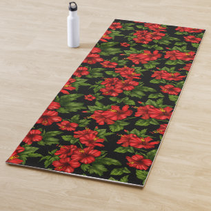Red flowers on the black background yoga mat