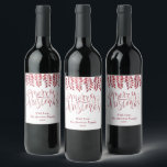 Red Foil Effect Typography Merry Christmas Wine Label<br><div class="desc">Decorate your Christmas party this holiday season with these unique and modern Christmas bottle labels. The design features a festive red foil effect typography script "Merry Christmas" with matching hanging foliage on a clean white background. Easily add your custom wording to these holiday labels by using the "Edit this design...</div>