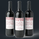 Red Foil Effect Typography Merry Christmas Wine Label<br><div class="desc">Decorate your Christmas party this holiday season with these unique and modern Christmas bottle labels. The design features a festive red foil effect typography script "Merry Christmas" with matching hanging foliage on a clean white background. Easily add your custom wording to these holiday labels by using the "Edit this design...</div>