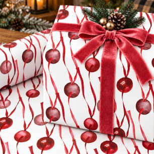 Red Glass Ornaments On Silk Ribbon Wrapping Paper