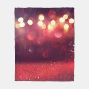 Red glitter vintage lights background. defocusedba fleece blanket