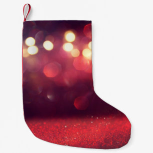 Red glitter vintage lights background. defocusedba small christmas stocking