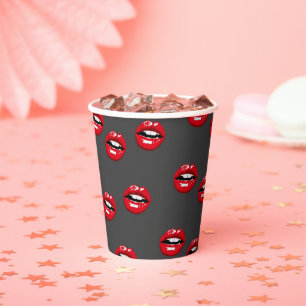 Red glossy lips on grey paper cups