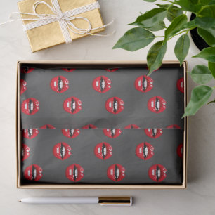 Red glossy lips on grey tissue paper