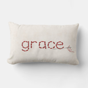 red GRACE text stitch with needle Lumbar Cushion