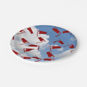 red graduation hats in sky paper plate