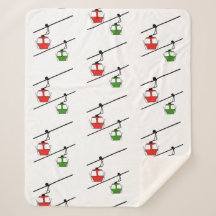 Red & green gondolas on white blanket