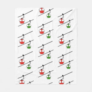 Red & green gondolas on white blanket