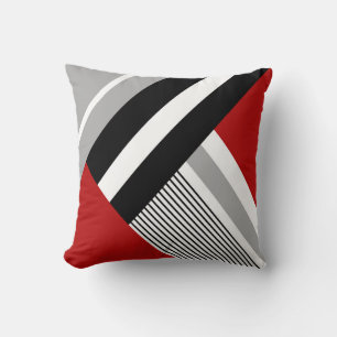 Red, grey, white and black geometric shapes cushion