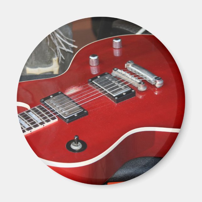 Red guitar on amp magnet (Front)