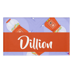 Red gumball machine on blue name tag