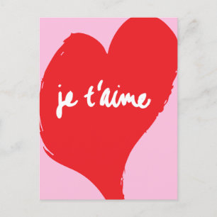 Red heart with je t’aime-text on pink background postcard