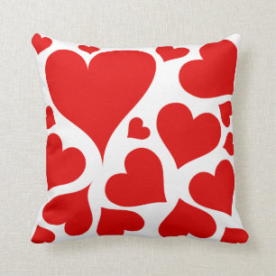 Red hearts on white love pillow