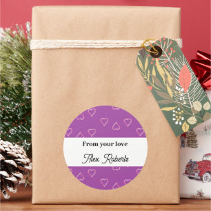 Red hearts pattern on purple classic round sticker