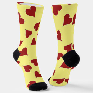 Red hearts pattern on yellow socks