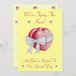 red hearts tied with pretty white bow for wedding invitation