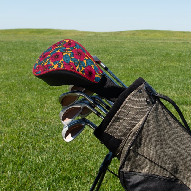 Red hibiscus on orange golf head cover (In Situ)