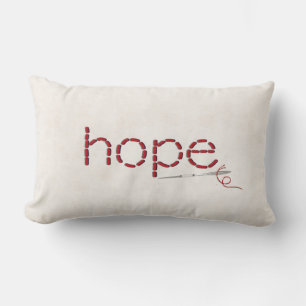 red Hope text stitch with needle Lumbar Cushion