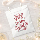 Red Joy to the World Christmas Lettering Favour Bag<br><div class="desc">Add a festive finishing touch to your holiday celebration with this "Joy to the World" favour bag. The hand-lettered chalkboard-inspired design gives it a rustic yet modern look. Text colour options allow you to match your event décor effortlessly. Great for Christmas events, winter weddings, or holiday business giveaways. A charming...</div>
