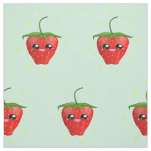 Red kawaii strawberry fruit on blue fabric