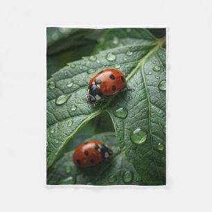 Red Ladybugs On Dewy Green Leaves Fleece Blanket