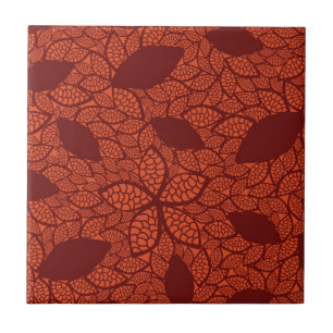 Red leaves pattern on orange ceramic tile