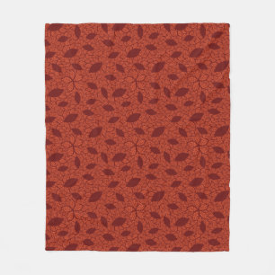 Red leaves pattern on orange fleece blanket