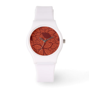 Red leaves pattern on orange watch