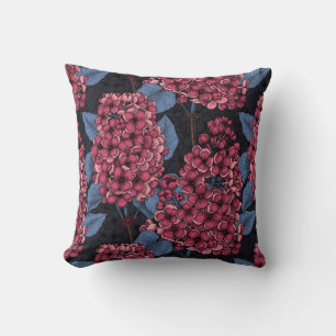 Red lilac on dark blue cushion